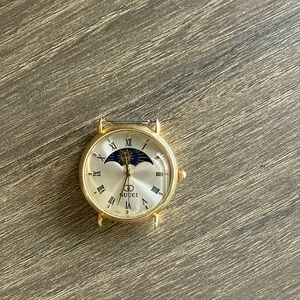 Gucci Gold and Silver watch with Blue Moonphase